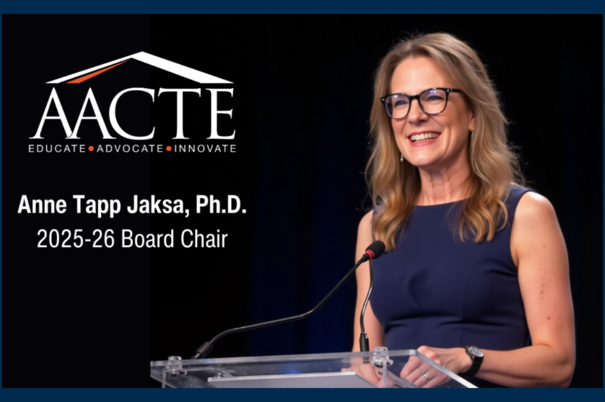 Smiling woman standing at lectern